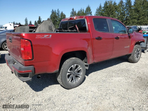 2021 Chevrolet Colorado 4WD Z71 with VIN 1GCGTDEN0M1259671, listed as a Copart auction lot 53388675 with 61,556 mi miles and Salvage Title. Bid and sale history available at carsss.com. Image 3.