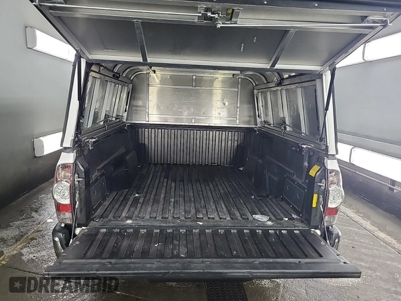 2013 Toyota Tacoma with VIN 5TFTX4CN0DX023945, listed as a IAAI auction lot 42848918 with 322,066 mi miles and . Bid and sale history available at DreamBid. Image 13.
