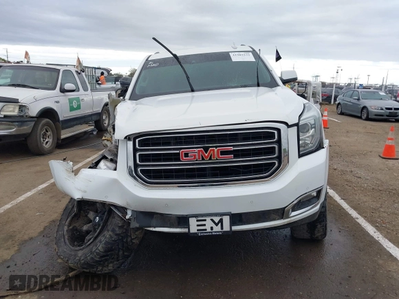 2019 GMC Yukon SLT with VIN 1GKS2BKC1KR167766, listed as a IAAI auction lot 41902532 with 97,793 mi miles. Bid and sale history available at carsss.com. Image 12.
