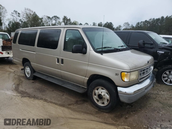 2001 Ford Econoline Passenger XL with VIN 1FBSS31LX1HA23564, listed as a Copart auction lot 77703044 with 276,538 mi miles and Salvage title. Bid and sale history available at DreamBid. Image 4.