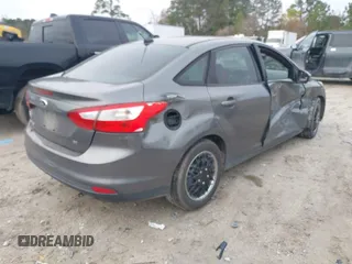 2012 Ford Focus SE with VIN 1FAHP3F24CL352340, listed as a IAAI auction lot 41118173 with 154,623 mi miles. Bid and sale history available at carsss.com. Image 4.