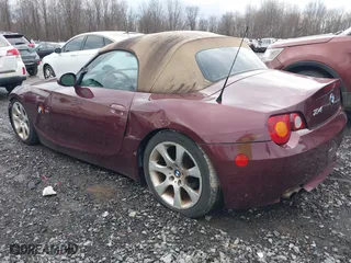 2004 BMW Z4 2.5i with VIN 4USBT33544LS50607, listed as a IAAI auction lot 41673776 with 156,585 mi miles. Bid and sale history available at carsss.com. Image 3.