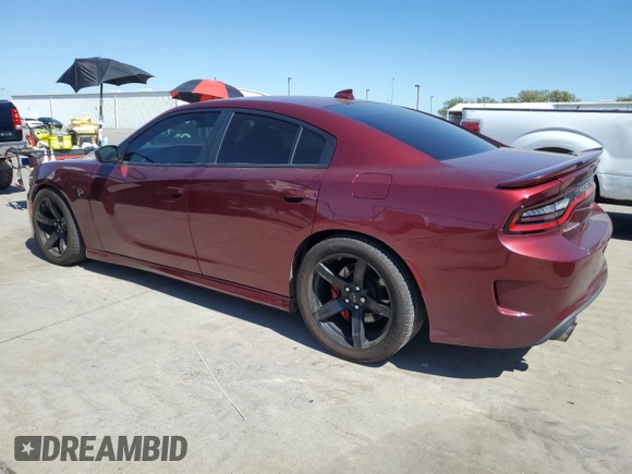 2019 Dodge Charger SRT Hellcat z VIN 2C3CDXL99KH726589, wystawiony jako Copart lot #50382825 z przebiegiem 36 117 mil mil oraz Czysty tytuł • Clean title. Historia ofert i sprzedaży dostępna na DreamBid. Obrazek 2.