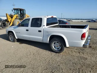 2001 Dodge Dakota Sport z VIN 1B7GL2AN81S120632, wystawiony jako Copart lot #50730415 z przebiegiem 191 302 mil mil oraz Czysty tytuł • Clean title. Historia ofert i sprzedaży dostępna na DreamBid. Obrazek 2.