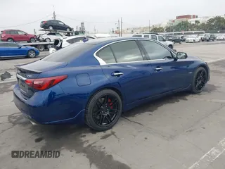 2020 Infiniti Q50 Red Sport 400 with VIN JN1FV7AP3LM630563, listed as a IAAI auction lot 42000146 with 63,327 mi miles and . Bid and sale history available at carsss.com. Image 4.