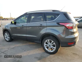 2017 Ford Escape SE with VIN 1FMCU0G91HUE07265, listed as a Copart auction lot 84231444 with 82,990 mi miles and Clean Title. Bid and sale history available at DreamBid. Image 2.