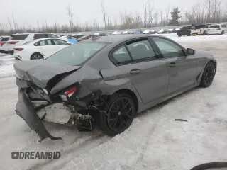 2021 BMW 5 Series M550i xDrive z VIN WBA13BK05MCF97316, wystawiony jako Copart lot #63713144 z przebiegiem Nie podano mil oraz Szkoda całkowita • Salvage title. Historia ofert i sprzedaży dostępna na DreamBid. Obrazek 3.