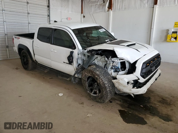 2018 Toyota Tacoma SR z VIN 3TMCZ5AN7JM178223, wystawiony jako Copart lot #49588605 z przebiegiem 179 064 mil mil oraz Szkoda całkowita • Salvage title. Historia ofert i sprzedaży dostępna na DreamBid. Obrazek 4.