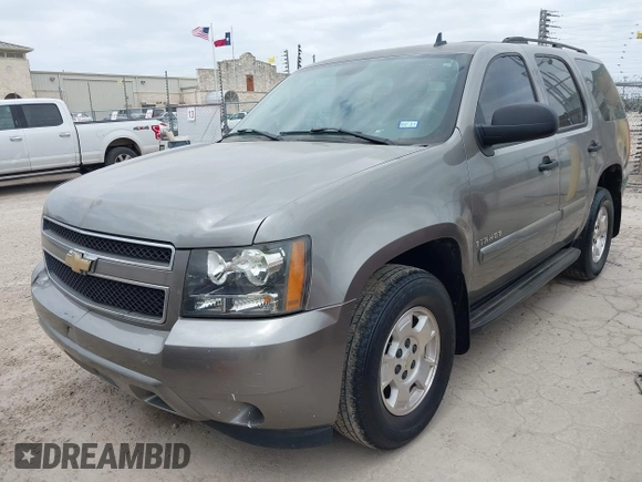 2007 Chevrolet Tahoe LS with VIN 1GNFC13C57R401893, listed as a IAAI auction lot 42046960 with 258,231 mi miles and . Bid and sale history available at DreamBid. Image 2.