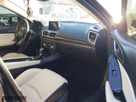 2018 Mazda Mazda3 4-Door Grand Touring with VIN 3MZBN1W34JM224997, listed as a IAAI auction lot 41421875 with 49,233 mi miles. Bid and sale history available at carsss.com. Image 5.