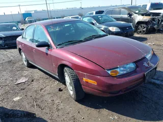 2002 Saturn SL with VIN 1G8ZK52792Z255716, listed as a IAAI auction lot 41773572 with 105,859 mi miles. Bid and sale history available at carsss.com. Image 1.