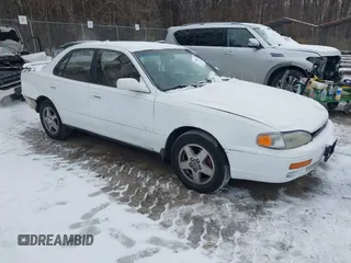 1996 Toyota Camry LE with VIN 4T1BF12K6TU871781, listed as a IAAI auction lot 41376072 with 390,913 mi miles and . Bid and sale history available at DreamBid. Image 1.