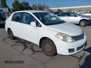 2007 Nissan Versa 1.8 SL with VIN 3N1BC11EX7L460203, listed as a IAAI auction lot 41462656 with 160,142 mi miles. Bid and sale history available at carsss.com. Image 1.