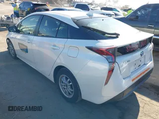 2016 Toyota Prius Two with VIN JTDKBRFUXG3001716, listed as a IAAI auction lot 42009763 with 177,132 mi miles and . Bid and sale history available at carsss.com. Image 3.