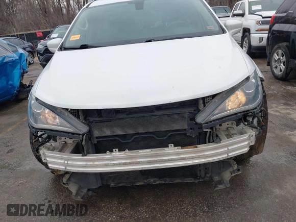 2017 Chrysler Pacifica Touring L with VIN 2C4RC1BG4HR583463, listed as a IAAI auction lot 41487599 with 180,459 mi miles and . Bid and sale history available at DreamBid. Image 6.