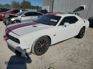 2014 Dodge Challenger SRT-8 z VIN 2C3CDYCJ4EH101599, wystawiony jako Copart lot #87943745 z przebiegiem 74 407 mil mil oraz Czysty tytuł • Clean title. Historia ofert i sprzedaży dostępna na DreamBid. Obrazek 1.