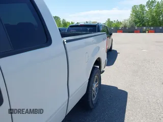 2007 Ford F-150 STX with VIN 1FTRX14W07FA87865, listed as a IAAI auction lot 42333510 with 173,973 mi miles and . Bid and sale history available at DreamBid. Image 6.