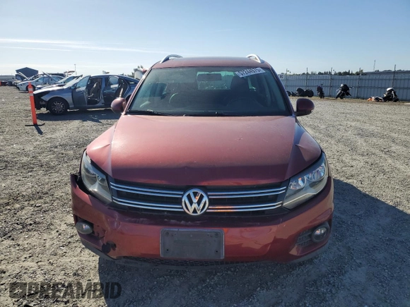 2013 Volkswagen Tiguan SE with VIN WVGBV7AX9DW012368, listed as a Copart auction lot 57244975 with 177,810 mi miles and Salvage title. Bid and sale history available at DreamBid. Image 5.