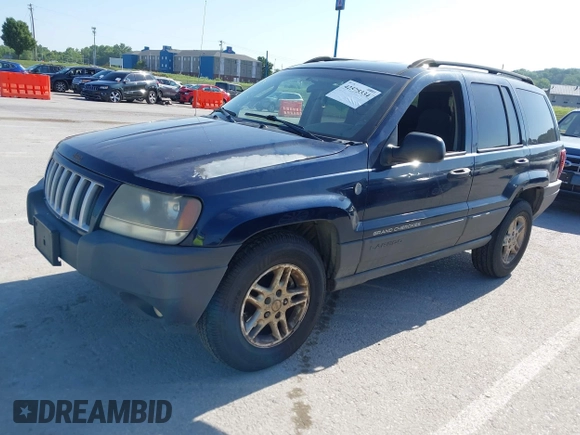 2004 Jeep Grand Cherokee Laredo with VIN 1J4GW48S54C415274, listed as a IAAI auction lot 42575334 with 172,932 mi miles and . Bid and sale history available at DreamBid. Image 2.
