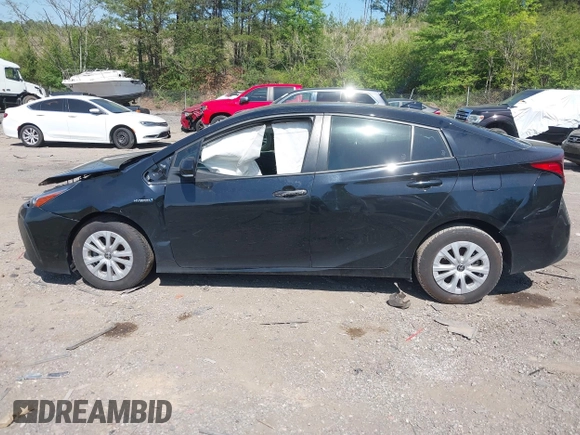 2022 Toyota Prius L Eco with VIN JTDKAMFU1N3182790, listed as a IAAI auction lot 41993264 with 124,777 mi miles and . Bid and sale history available at DreamBid. Image 13.