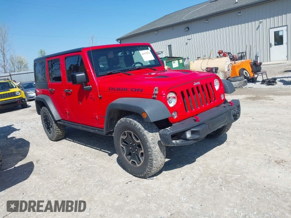 2015 Jeep Wrangler Unlimited Rubicon Hard Rock with VIN 1C4HJWFG9FL525556, listed as a IAAI auction lot 41973576 with 246,949 mi miles and . Bid and sale history available at DreamBid. Image 1.