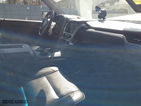2019 Chevrolet Tahoe LT with VIN 1GNSKBKC0KR121493, listed as a IAAI auction lot 41656734 with 163,994 mi miles. Bid and sale history available at carsss.com. Image 5.