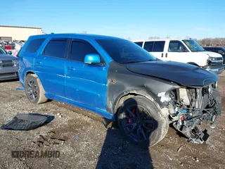2018 Dodge Durango SRT z VIN 1C4SDJGJ1JC415720, wystawiony jako IAAI lot #41193674 z przebiegiem 63 140 mil mil oraz . Historia ofert i sprzedaży dostępna na DreamBid. Obrazek 1.