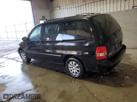 2005 Kia Sedona LX with VIN KNDUP131356663462, listed as a Copart auction lot 78037404 with 131,793 mi miles and Salvage Title. Bid and sale history available at carsss.com. Image 2.