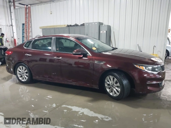 2016 Kia Optima LX with VIN 5XXGT4L3XGG073744, listed as a IAAI auction lot 41586212 with 111,628 mi miles. Bid and sale history available at carsss.com. Image 13.