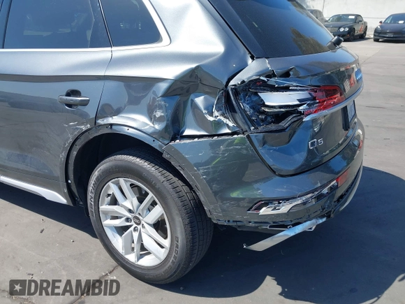 2022 Audi Q5 S line Premium z VIN WA1GAAFY3N2088773, wystawiony jako IAAI lot #41969990 z przebiegiem 22 922 mil mil oraz . Historia ofert i sprzedaży dostępna na DreamBid. Obrazek 12.