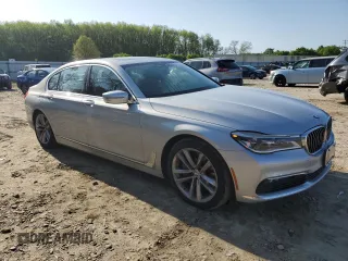 2016 BMW 7 Series 750i xDrive с VIN WBA7F2C58GG419163, выставлен на аукционе Copart как лот 52429835 с пробегом 93 025 миль миль и Списание • Salvage title. История ставок и продаж доступна на DreamBid. Изображение 4.