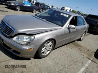 2005 Mercedes-Benz S-Class 5.0L with VIN WDBNG75J15A447352, listed as a Copart auction lot 53681734 with 0 mi miles and Salvage Title. Bid and sale history available at carsss.com. Image 1.
