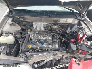 1997 Toyota Avalon XL with VIN 4T1BF12B1VU198756, listed as a IAAI auction lot 41613887 with 217,863 mi miles. Bid and sale history available at carsss.com. Image 10.