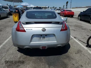 2014 Nissan 370Z Nismo with VIN JN1AZ4EH8EM633218, listed as a Copart auction lot 57296165 with Not provided miles and Salvage title. Bid and sale history available at DreamBid. Image 6.