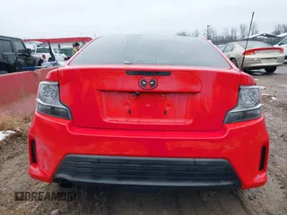 2015 Scion tC z VIN JTKJF5C79FJ013303, wystawiony jako IAAI lot #41581714 z przebiegiem Nie podano mil oraz . Historia ofert i sprzedaży dostępna na DreamBid. Obrazek 16.