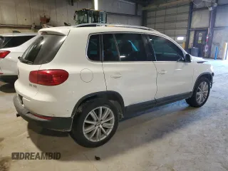 2012 Volkswagen Tiguan SE with VIN WVGAV7AX8CW533592, listed as a Copart auction lot 43246395 with 149,928 mi miles and Salvage Title. Bid and sale history available at DreamBid. Image 3.