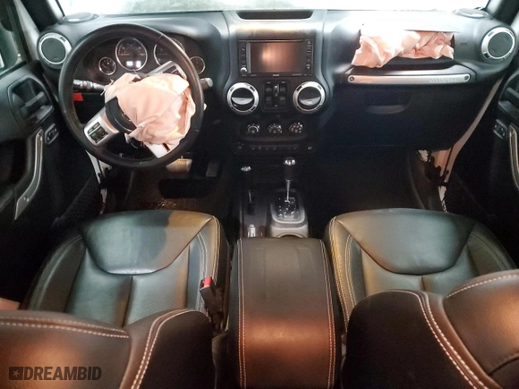 2017 Jeep Wrangler Unlimited Rubicon Recon with VIN 1C4HJWFG9HL543266, listed as a Copart auction lot 87771705 with 50,223 mi miles and Salvage Title. Bid and sale history available at carsss.com. Image 8.