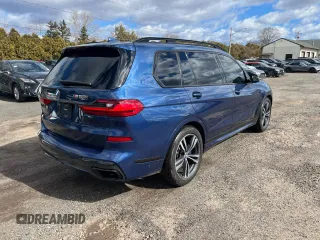 2020 BMW X7 M50i z VIN 5UXCX6C08L9B15440, wystawiony jako Copart lot #48511485 z przebiegiem 82 788 mil mil oraz Czysty tytuł • Clean title. Historia ofert i sprzedaży dostępna na DreamBid. Obrazek 3.