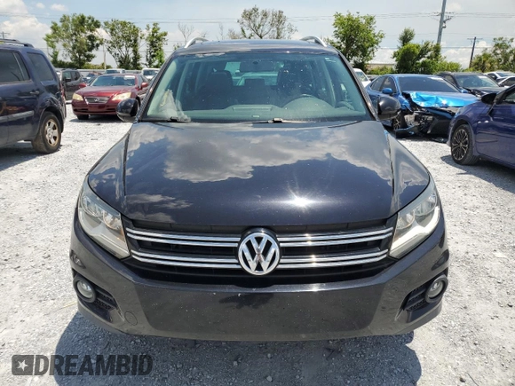 2014 Volkswagen Tiguan SE z VIN WVGAV3AX8EW613762, wystawiony jako Copart lot #61385765 z przebiegiem 167 278 mil mil oraz Czysty tytuł • Clean title. Historia ofert i sprzedaży dostępna na DreamBid. Obrazek 5.