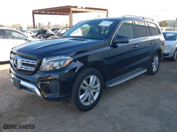 2017 Mercedes-Benz GLS with VIN 4JGDF6EE8HA855778, listed as a IAAI auction lot 41744342 with 89,012 mi miles. Bid and sale history available at carsss.com. Image 2.