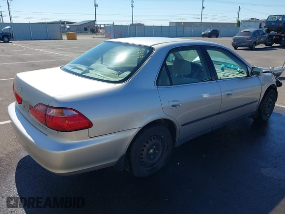 1999 Honda Accord LX with VIN JHMCG5545XC028563, listed as a IAAI auction lot 42461054 with 212,100 mi miles and . Bid and sale history available at DreamBid. Image 4.