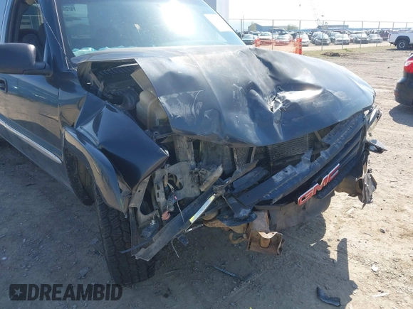 2003 GMC Sierra 1500 SLT z VIN 1GTEK19T03E191705, wystawiony jako IAAI lot #42145392 z przebiegiem Nie podano mil oraz . Historia ofert i sprzedaży dostępna na DreamBid. Obrazek 6.