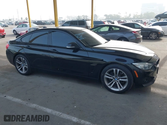 2015 BMW 4 Series 428i with VIN WBA4A9C52FGL85228, listed as a IAAI auction lot 41228043 with 152,729 mi miles and . Bid and sale history available at DreamBid. Image 13.
