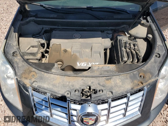 2016 Cadillac SRX Luxury Collection with VIN 3GYFNBE37GS556832, listed as a Copart auction lot 71701164 with 118,871 mi miles and Salvage title. Bid and sale history available at DreamBid. Image 12.