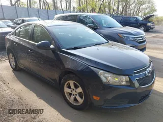 2014 Chevrolet Cruze 1LT with VIN 1G1PC5SB1E7302745, listed as a IAAI auction lot 42142048 with 160,000 mi miles and . Bid and sale history available at DreamBid. Image 1.