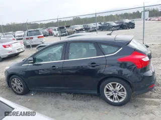 2012 Ford Focus SEL with VIN 1FAHP3M2XCL363037, listed as a IAAI auction lot 41816361 with 101,693 mi miles. Bid and sale history available at carsss.com. Image 14.