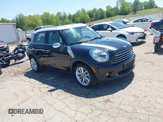 2014 MINI Countryman with VIN WMWZB3C5XEWR38356, listed as a IAAI auction lot 42042937 with 94,625 mi miles and . Bid and sale history available at DreamBid. Image 1.