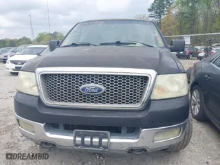 2004 Ford F-150 XLT with VIN 1FTPW14534KB78908, listed as a IAAI auction lot 41953944 with 334,411 mi miles. Bid and sale history available at carsss.com. Image 6.