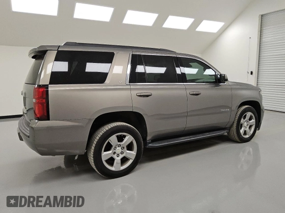 2019 Chevrolet Tahoe LT with VIN 1GNSCBKC0KR100687, listed as a Copart auction lot 53123455 with 104,006 mi miles and Clean title. Bid and sale history available at DreamBid. Image 3.