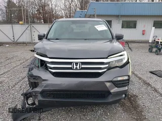 2017 Honda Pilot EX-L with VIN 5FNYF6H59HB029160, listed as a IAAI auction lot 41557192 with 157,153 mi miles and . Bid and sale history available at DreamBid. Image 13.